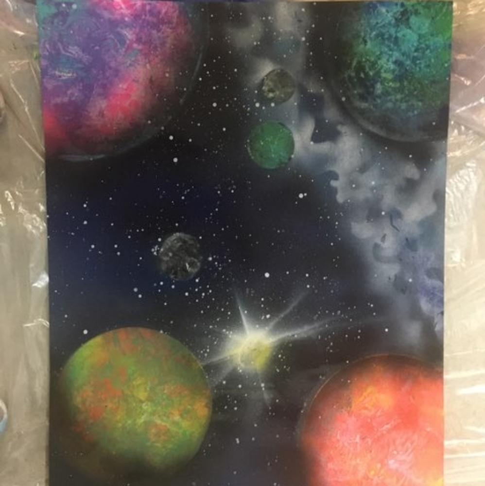 Hand made posters of planets and stars